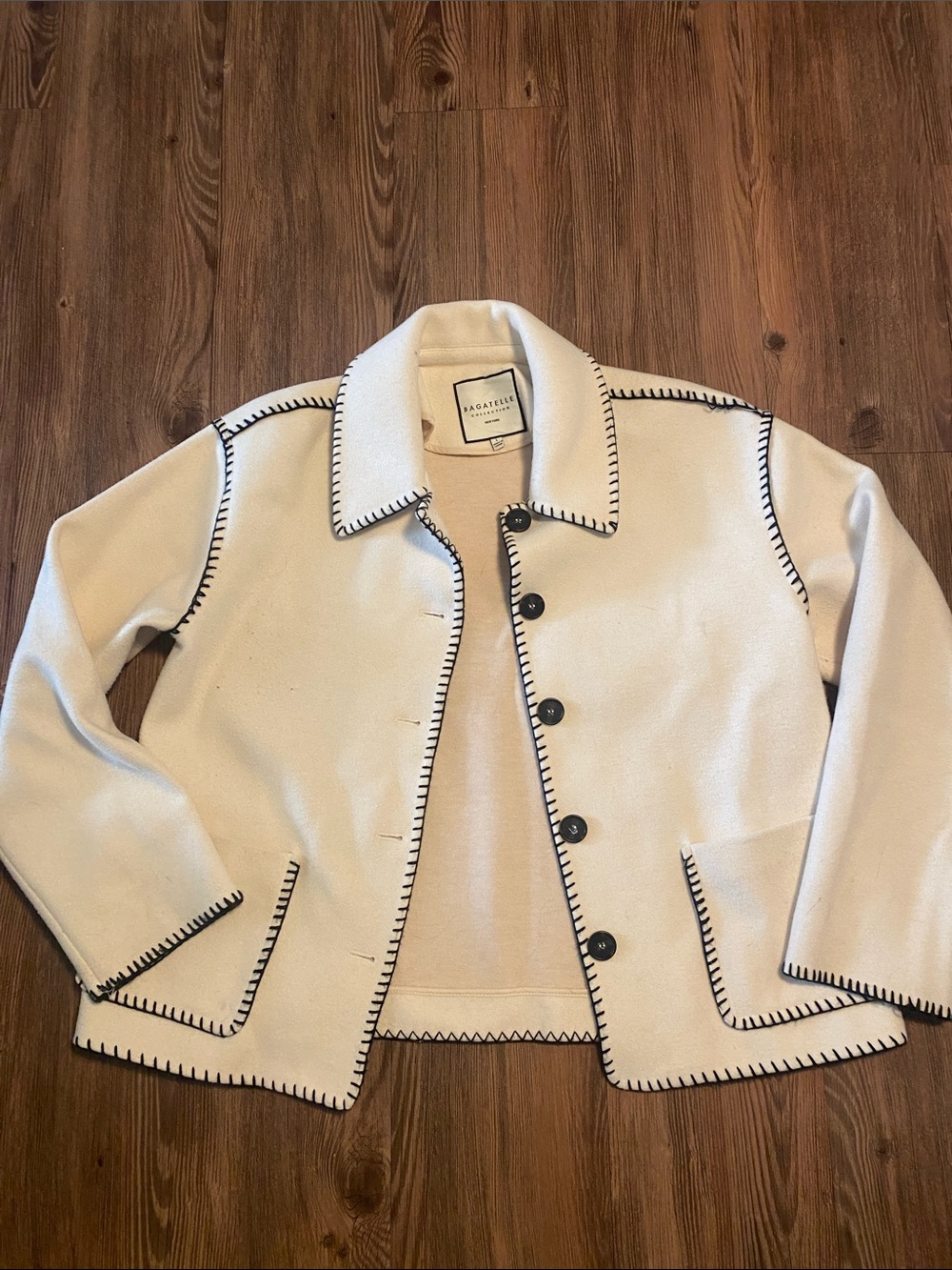 Cream Jacket with Black Stitch Trim and Buttons